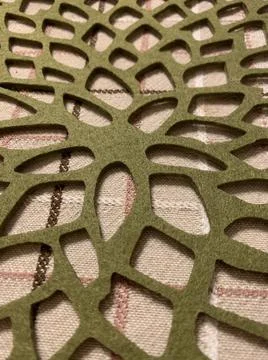 Patterned green felt tablecloth, abstract textured background, selective focu Foto stock