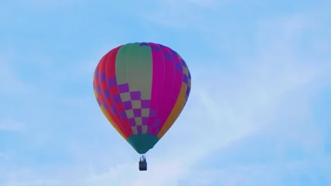 Patterned hot air balloon in the sky Stock Footage 345536561
