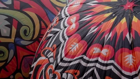 Patterned hot air balloons flying in the sky Stock Footage 255119308