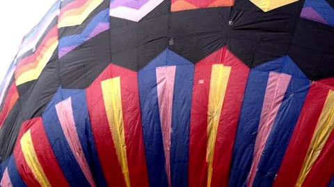 Patterned hot air balloons flying in the sky Stock Footage 255119319