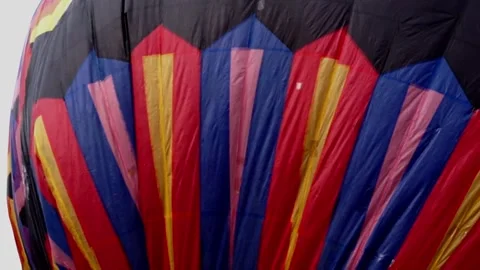 Patterned hot air balloons flying in the sky Stock Footage 255119337