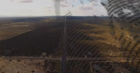 Patterned overlay drifting into aerial tech shot, sweeping, obscuring road, Stock Footage 330238436
