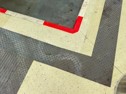 Patterned pavement with contrasting colors at a public space in an urban area Stock Photos