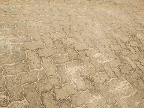 Patterned pavement road in the city Stock Photos