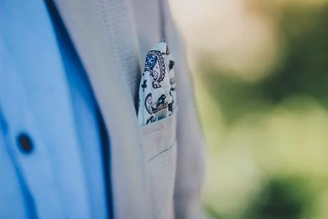 Patterned pocket square in gray suit jacket Stock Photos