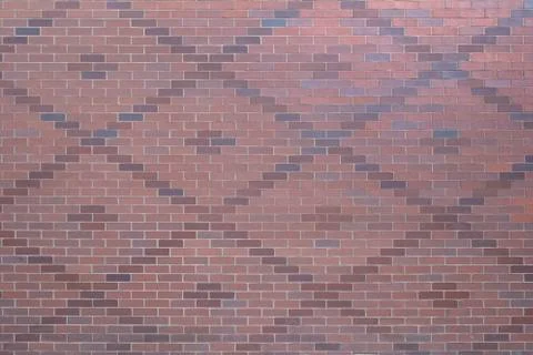 Patterned red brick wall 스톡 사진