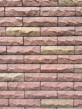 Patterned Red Brick Wall with Rectangular Tiles Stock Photos