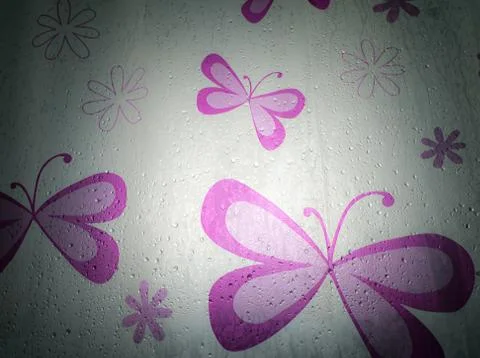 Patterned shower curtains and the light from the light box. Stock Photos