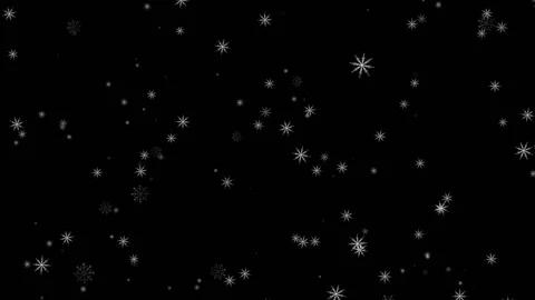 Patterned snowflakes hit the wind and swirl. New Year's greetings. Stock Footage 135581040