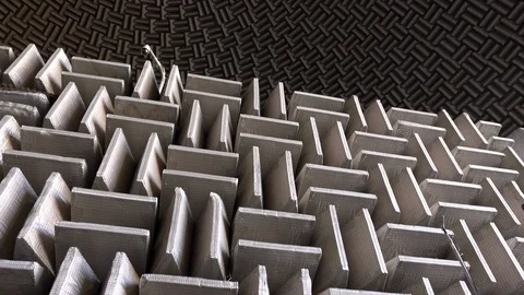 Patterned soundproof crates against the wall in dome Stock Footage 93577947