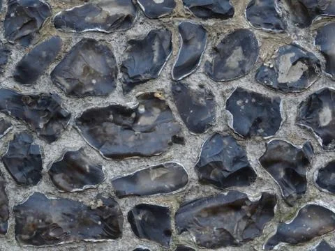 Patterned Stone Wall Background Stock Photos