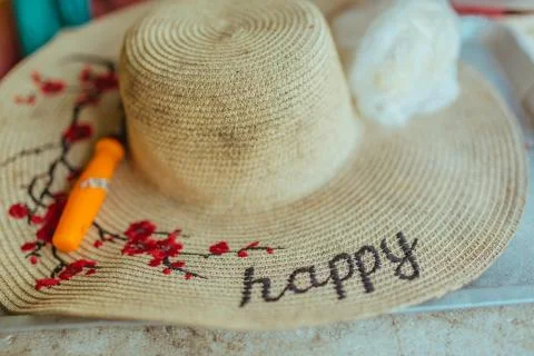 Patterned Straw hat on foam box in summer day Stock Photos