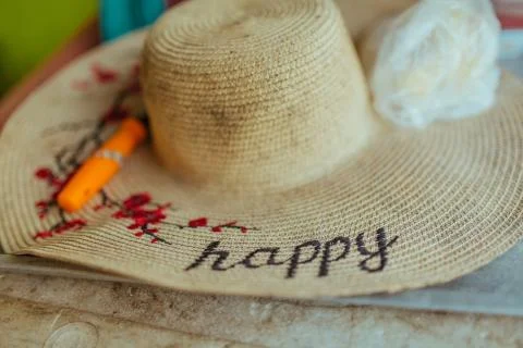 Patterned Straw hat on foam box in summer day Stock Photos
