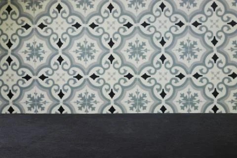 Patterned Tile Wall With Dark Tabletop Background for Interior Kitchen Display a Stock Photos