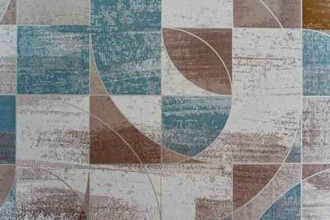 A patterned wall with a blue and brown design Foto stock
