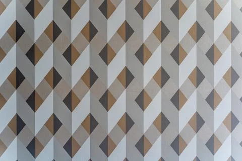 A patterned wallpaper with brown and white squares Stock Photos