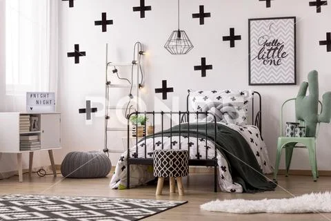 Patterned wallpaper in kid's bedroom Stock Photos