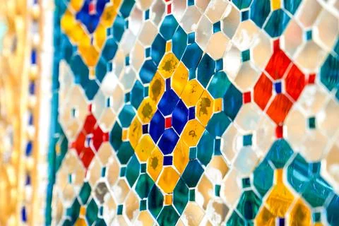 Patterned walls, frames, and roof edges create a rich study of Thai temple .. Foto stock