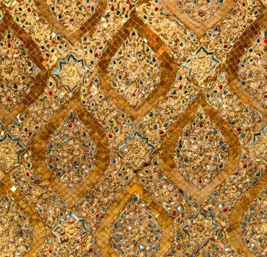 Patterned walls, frames, and roof edges create a rich study of Thai temple .. 写真素材