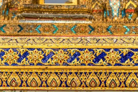 Patterned walls, frames, and roof edges create a rich study of Thai temple .. Foto stock
