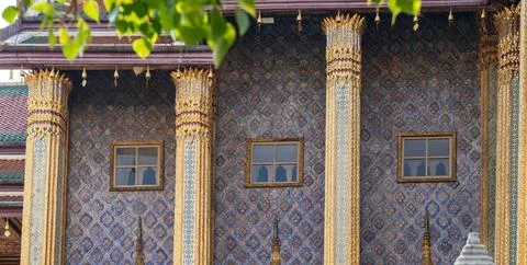 Patterned walls, frames, and roof edges create a rich study of Thai temple .. Foto stock