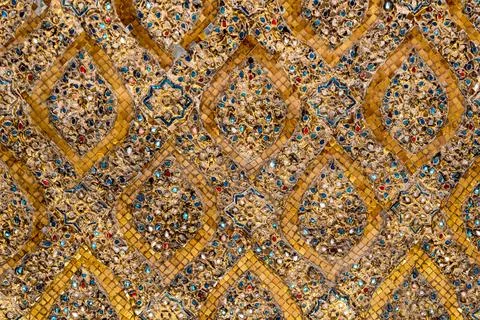 Patterned walls, frames, and roof edges create a rich study of Thai temple .. Foto stock