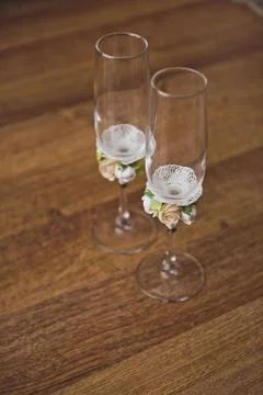 Patterned wine glasses on a textured table 8897. Stock Photos