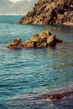 Patterns and foam of waves in the ocean, shot with analogue color film techni Stock Photos