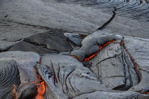 Patterns and forms of lava from an active volcanic eruption. Stock Photos