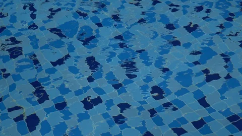 Patterns and ripples of swimming pool blue water surface background. Stock Footage 127959645