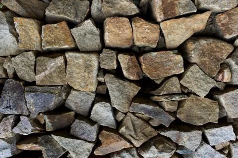 Patterns and textures of Ancient rock walls Stock Photos