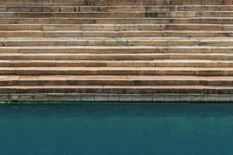 Patterns and textures of ancient steps for pond Stock Photos