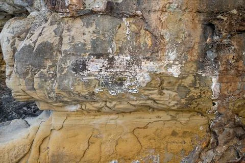 Patterns and textures of a rock wall Stock Photos