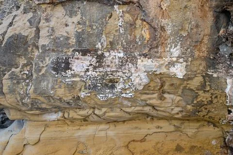 Patterns and textures of a rock wall Stock Photos