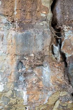 Patterns and textures of a rock wall Stock Photos