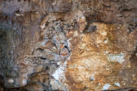 Patterns and textures of a rock wall Stock Photos