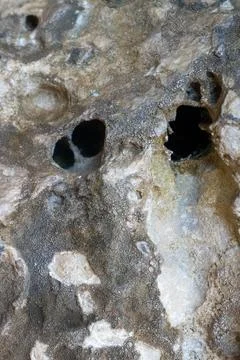 Patterns and textures of a rock wall Stock Photos