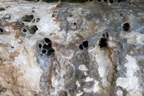 Patterns and textures of a rock wall Stock Photos