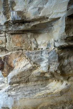 Patterns and textures of a rock wall Stock Photos