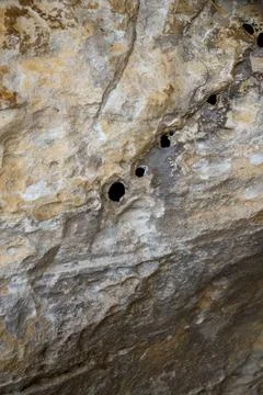 Patterns and textures of a rock wall Stock Photos