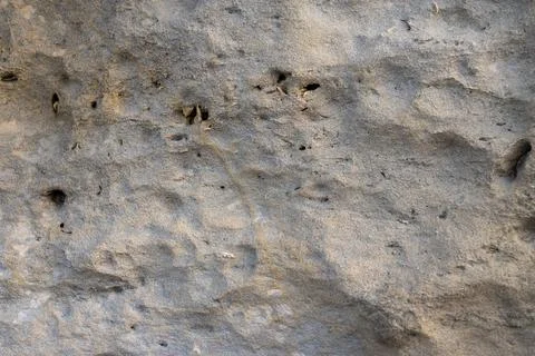 Patterns and textures of a rock wall Stock Photos