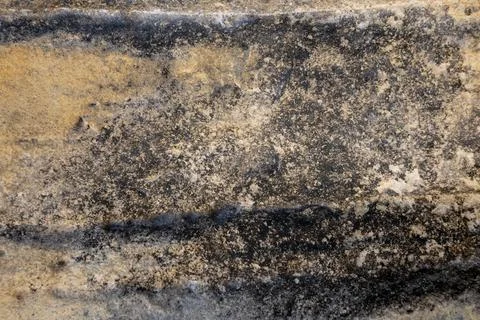 Patterns and textures of a rock wall Stock Photos