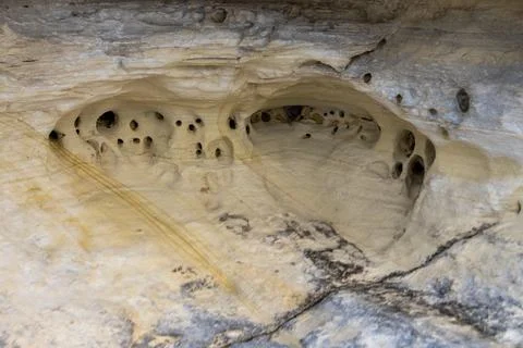 Patterns and textures of a rock wall Stock Photos