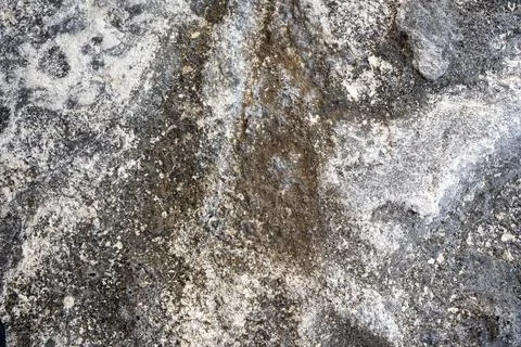 Patterns and textures of a rock wall Stock Photos