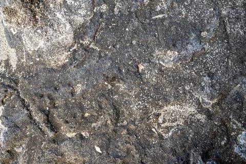 Patterns and textures of a rock wall Stock Photos