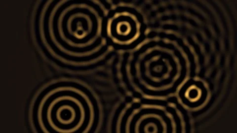 Patterns of circles appearing in waves on a dark background Stock Footage 338277581