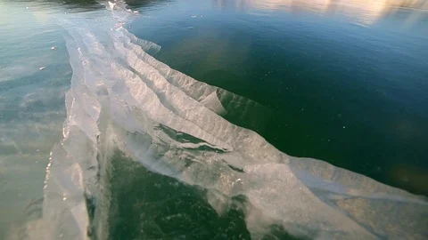 Patterns in clean ice of lake Baikal in motion Stock Footage 84877544