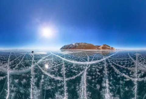 Patterns of cracks on a blue winter ice of Lake Baikal from Olkhon Stock Photos