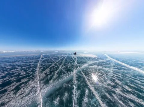 Patterns of cracks on a blue winter ice of Lake Baikal from Olkhon Stock Photos
