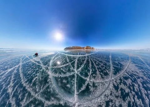 Patterns of cracks on a blue winter ice of Lake Baikal from Olkhon Stock Photos